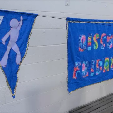 a banner for disco friday at the pool at the bay view family ymca