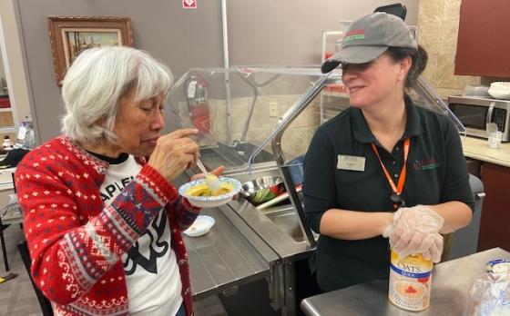 a lily cafe staff member with maplewood family ymca member