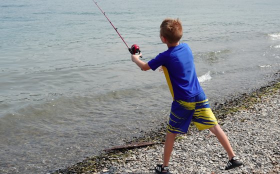 Kid Fishing at Glacier Lake