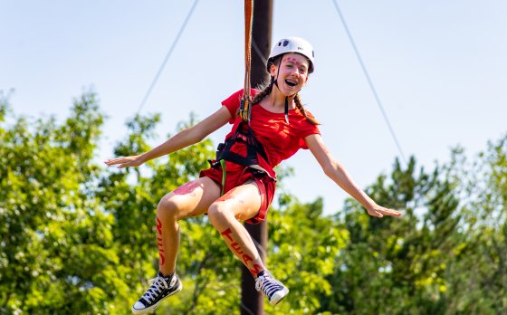 Girl Ziplining at Camp Northpoint