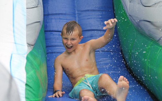 Kid Going Down Waterslide at Eastside