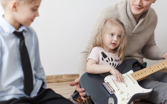 Little Girl Playing Music