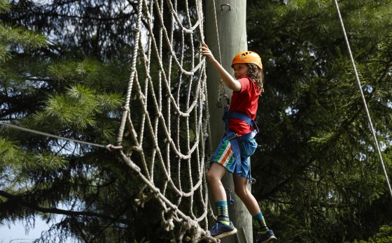 Kid Climbing at Camp Gorham