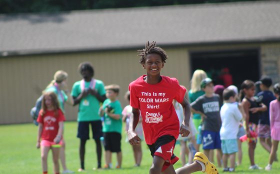Kid Running at Day Camp