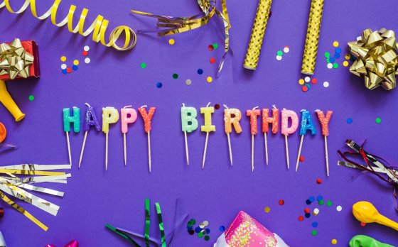 Happy birthday cake toppers and party favors.