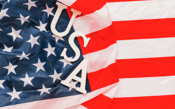 Letters spelling out "USA" on an American Flag