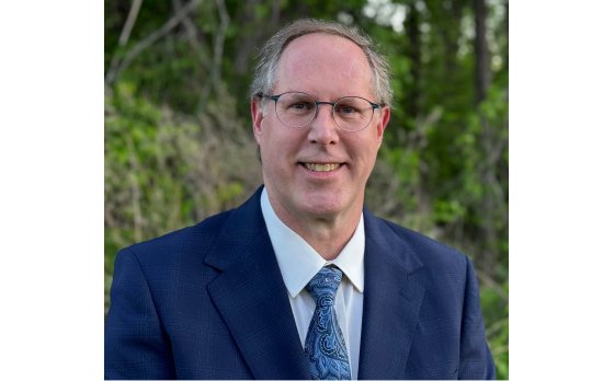headshot for VP of member experience chris schroll