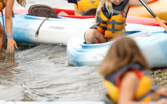 campers kayaking at cory's waterfront
