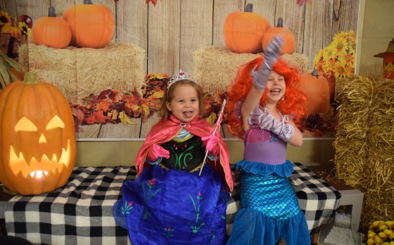 kids dressed in Halloween costumes 