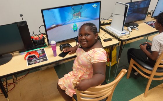  Girl playing a computer game at Thurston.