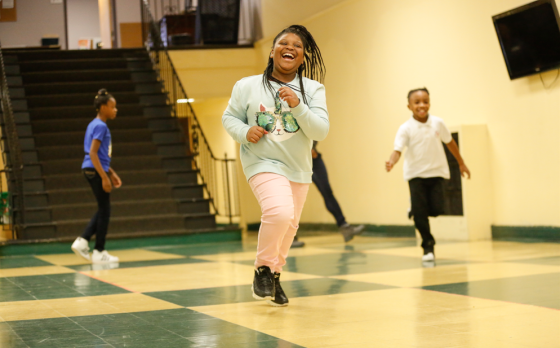 kids running and playing in the hall