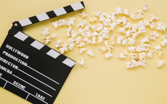 movie slate with popcorn