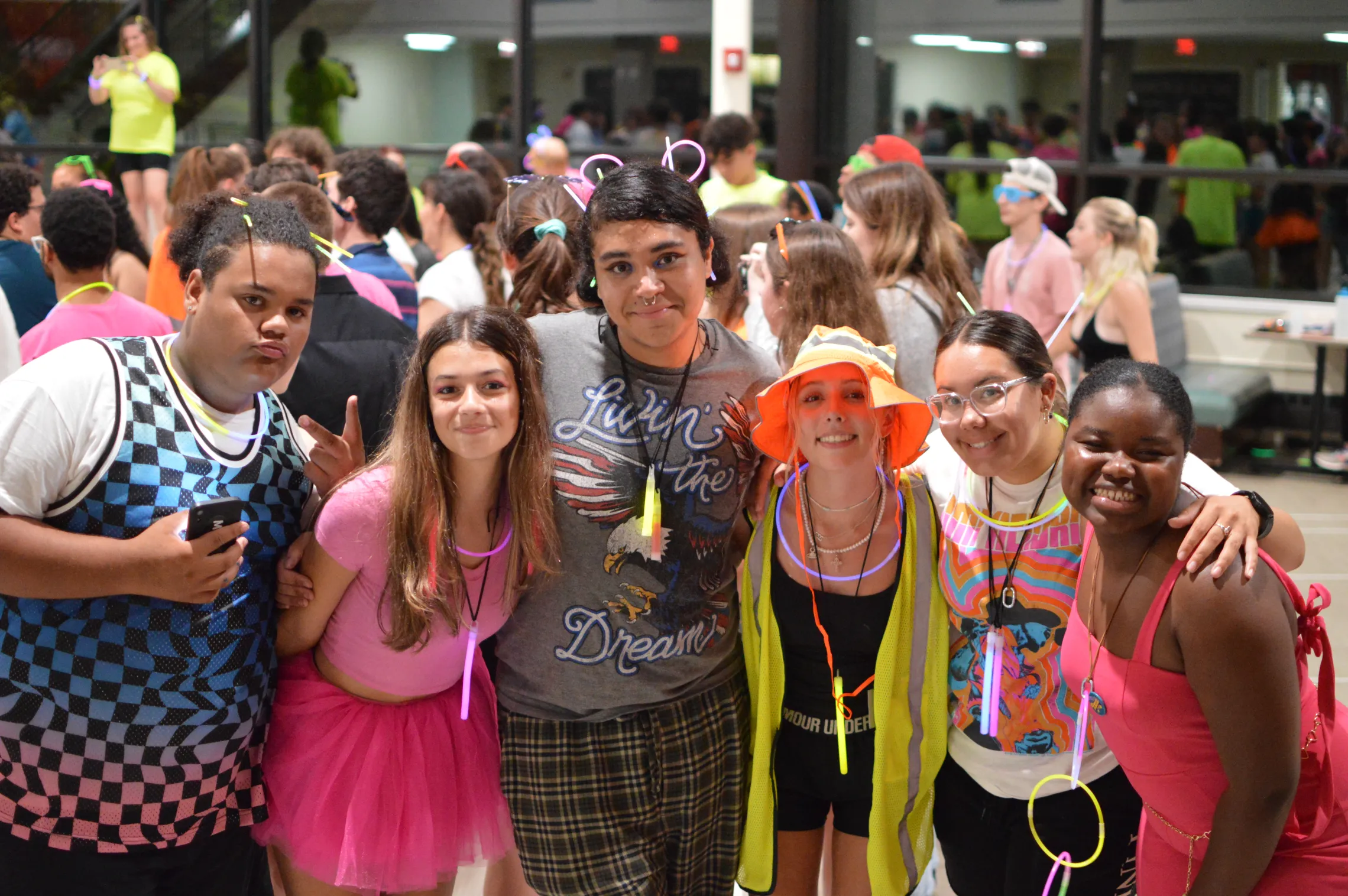 a group of teens smiling at the camera