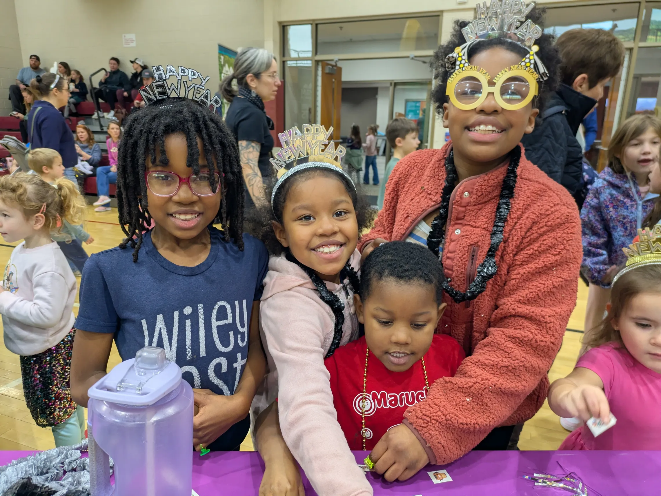 Kids smiling, celebrating the New Year