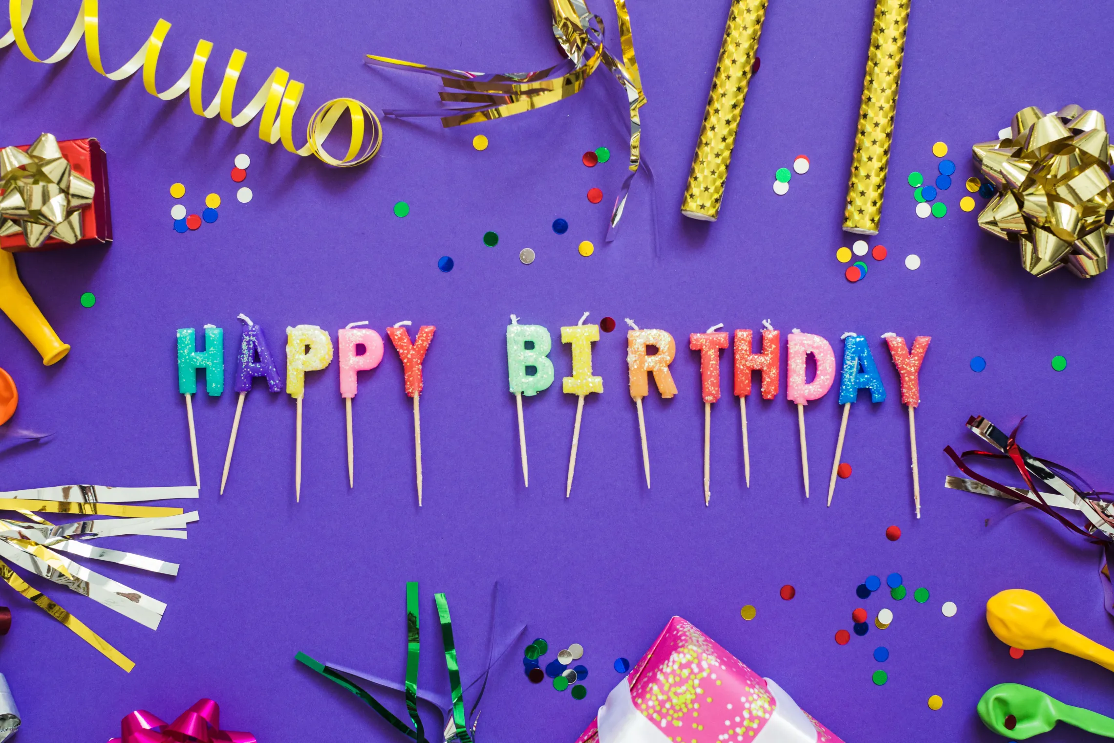 Happy birthday cake toppers and party favors.