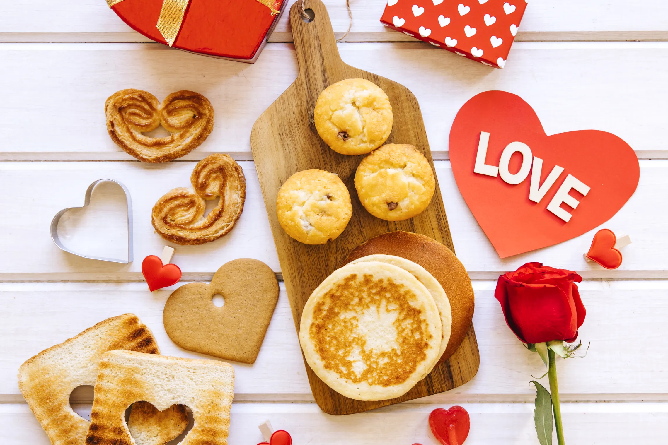 A breakfast spread alongside Valentine's Day decorations.