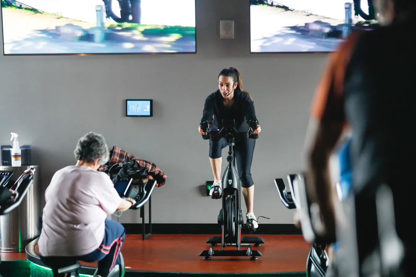 cycle instructor teaching a cycle class