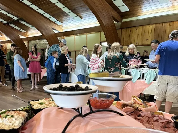 People in line for food at brunch