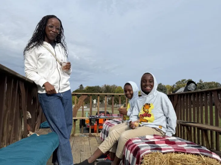 family on hay ride at fall fest