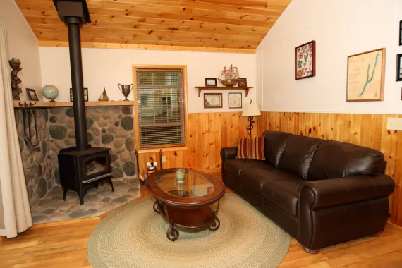 a photo of the living room of the alumni cabin at Camp Cory