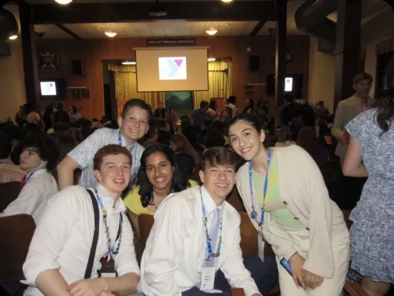 a group of 5 teens at a Youth and Government conference