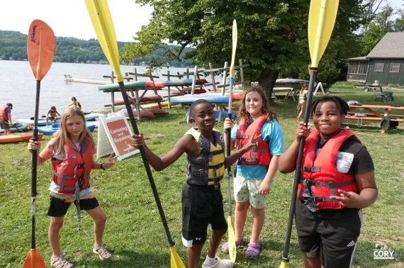 BYMOC Initiative participants prepare to kayak while visiting YMCA Camp Cory