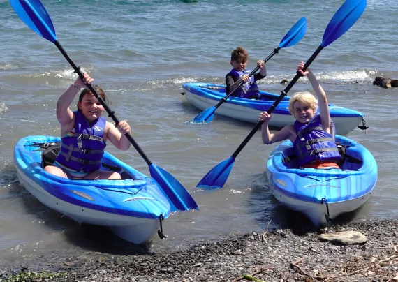 Camp Glacier Lake Kids in Boats