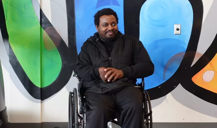 a ymca member in a wheelchair set up for an interview