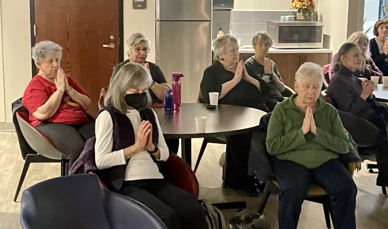 a group at the Schottland Family YMCA doing a meditation session