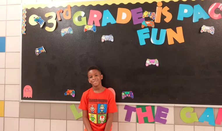a young boy at School 8 in our Power Scholars Academy