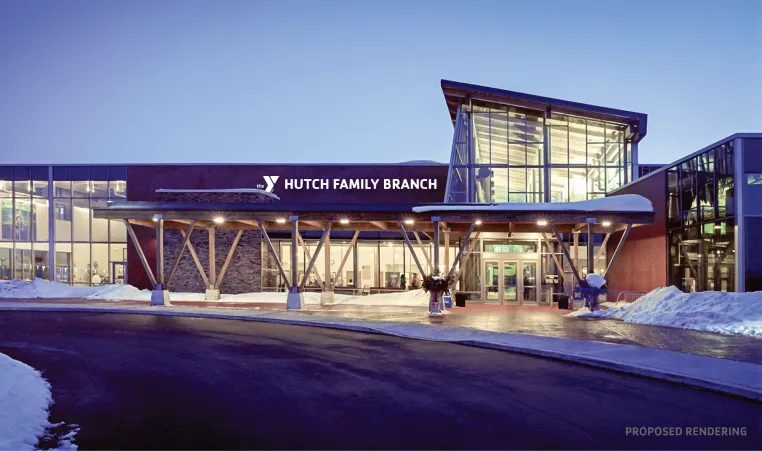 the outside of the current Eastside Family YMCA with the new name - Hutch Family YMCA - on the sign above the entrance