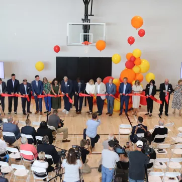 a photo of the ceremonial ribbon cutting at the sands family ymca