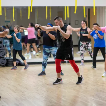 members of ymca of greater rochester take part in group exercise class