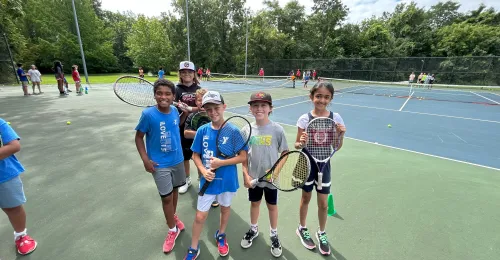 Kids Playing Tennis