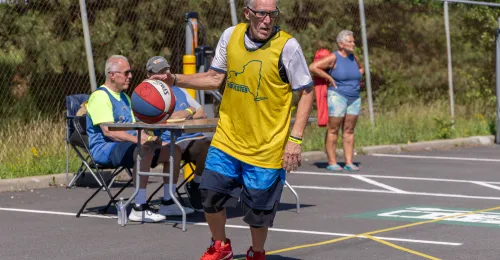 an older adult playing in the Macker tournament