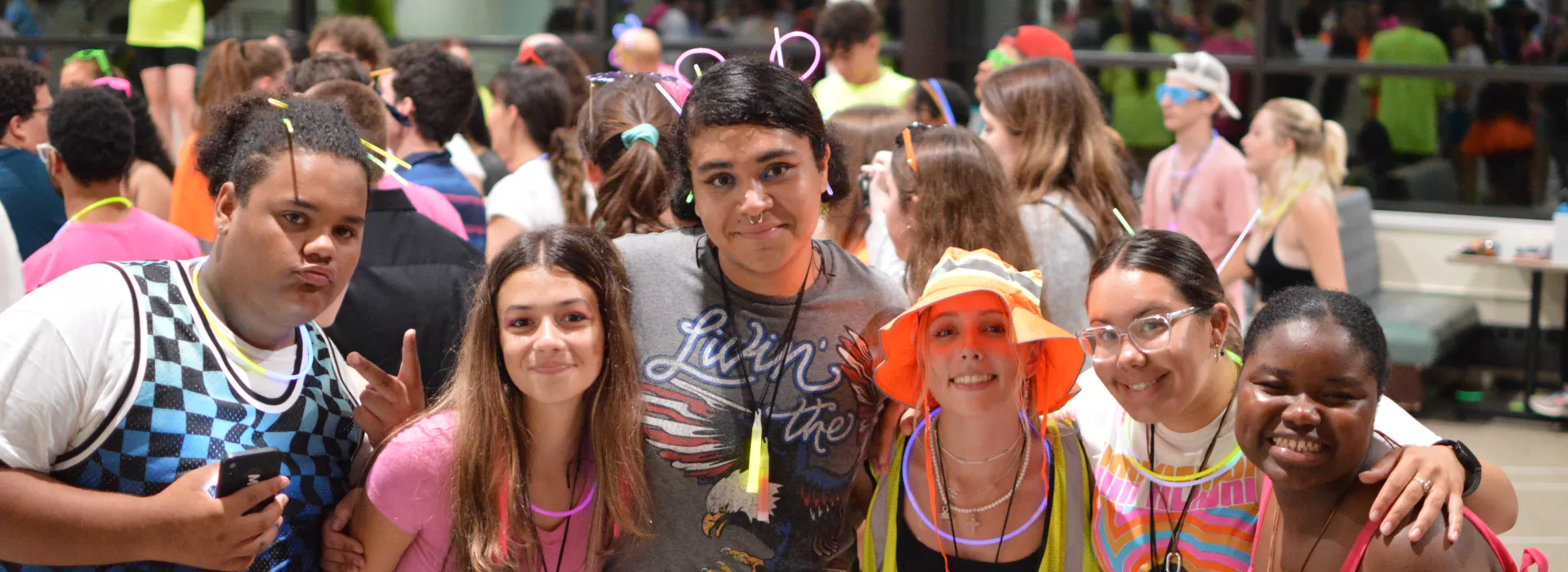 a group of teens smiling at the camera