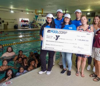 ymca_receives_donation_to_support_water_safety_efforts.jpg